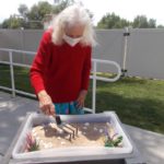 elaine at sharmar village interacting with zen box
